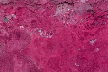 Çatlakları ve çizikleri olan eski beton duvarın dokusu arka plan olarak kullanılabilir.