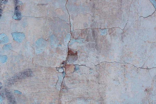 亀裂や傷のある古いコンクリート壁のテクスチャを背景に使用できます — ストック写真