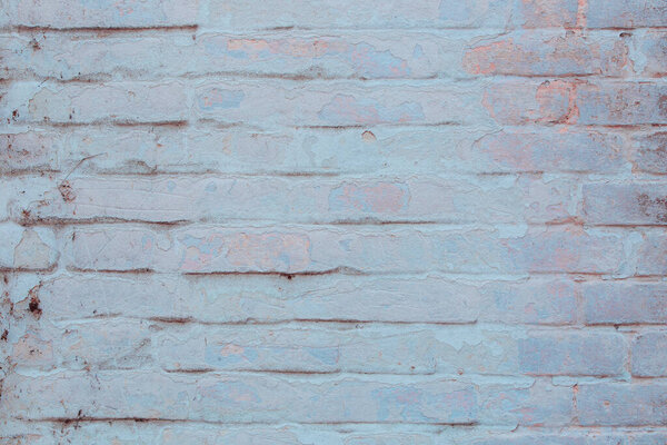 Texture of a brick wall with a pattern of a white bricks