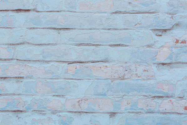 Old brick wall background with texture and cracks
