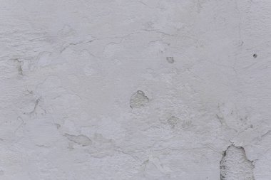 Çatlak beton duvarın çatlaklardan ve çiziklerden oluşan dokusu arka plan olarak kullanılabilir.
