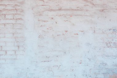 Çatlakları ve çizikleri olan beton bir duvarın dokusu arka plan olarak kullanılabilir.