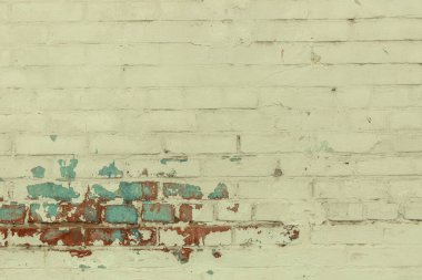 Kırık boyalı eski tuğla duvar
