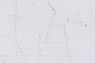 çatlakları ve çizikleri olan bir duvarın dokusu arka plan olarak kullanılabilir.