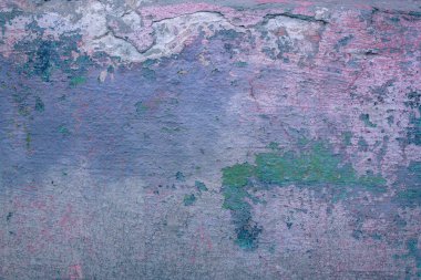 Çatlakları ve çizikleri olan beton bir duvarın dokusu arka plan olarak kullanılabilir.