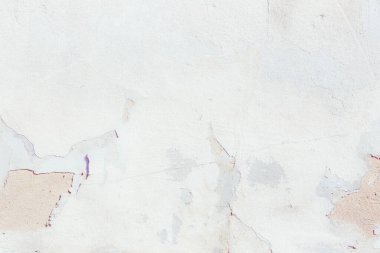 Çatlakları ve çizikleri olan eski beton duvarın dokusu arka plan olarak kullanılabilir.