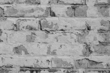 Çatlakları ve çizikleri olan tuğla duvar dokusu arka plan olarak kullanılabilir.