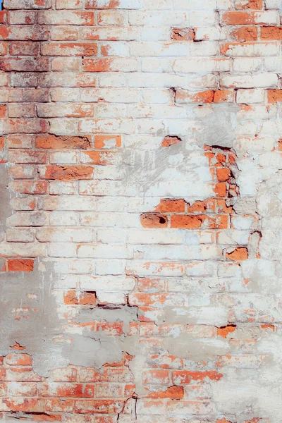 old brick wall with red and white bricks