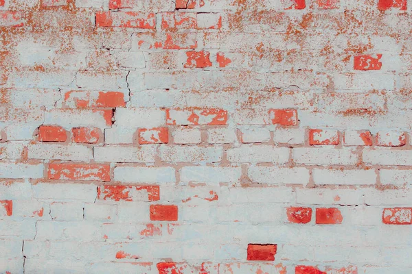 Çatlakları ve çizikleri olan tuğla duvar dokusu arka plan olarak kullanılabilir.