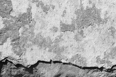 Çatlakları ve çizikleri olan beton bir duvarın dokusu arka plan olarak kullanılabilir.