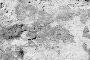 Çatlakları ve çizikleri olan beton bir duvarın dokusu arka plan olarak kullanılabilir.