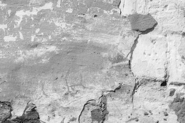 Çatlakları ve çizikleri olan beton bir duvarın dokusu arka plan olarak kullanılabilir.