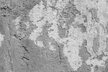 Çatlakları ve çizikleri olan beton bir duvarın dokusu arka plan olarak kullanılabilir.
