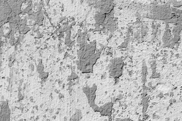 Çatlakları ve çizikleri olan beton bir duvarın dokusu arka plan olarak kullanılabilir.