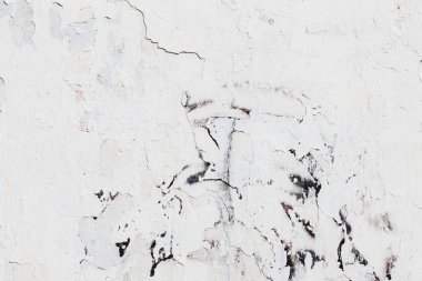 Çatlak beton duvarın çatlaklardan ve çiziklerden oluşan dokusu arka plan olarak kullanılabilir.