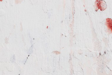 Çatlakları ve çizikleri olan beton bir duvarın dokusu arka plan olarak kullanılabilir.