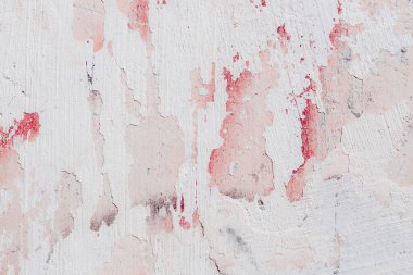 çatlakları ve çizikleri olan bir duvarın dokusu arka plan olarak kullanılabilir.