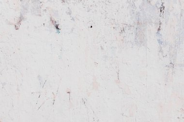 Çatlakları ve çizikleri olan beton bir duvarın dokusu arka plan olarak kullanılabilir.