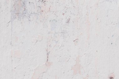 Çatlakları ve çizikleri olan beton bir duvarın dokusu arka plan olarak kullanılabilir.