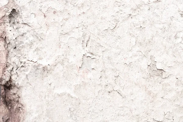 Çatlakları ve çizikleri olan eski beton duvarın dokusu arka plan olarak kullanılabilir.