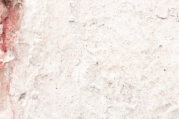 Çatlakları ve çizikleri olan eski beton duvarın dokusu arka plan olarak kullanılabilir.