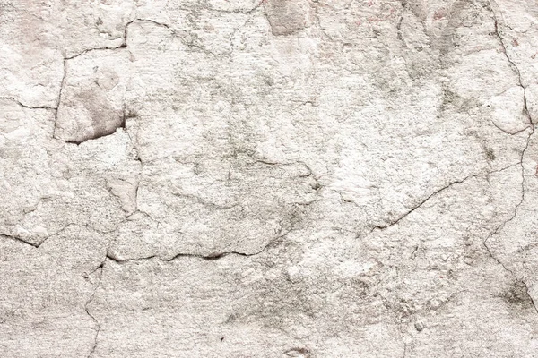 stock image texture of a concrete wall with cracks and scratches which can be used as a background