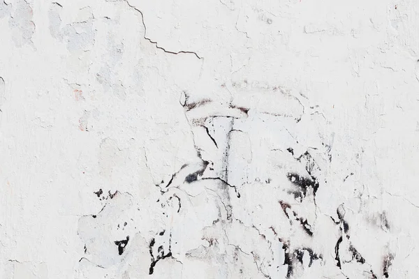Çatlak beton duvarın çatlaklardan ve çiziklerden oluşan dokusu arka plan olarak kullanılabilir.