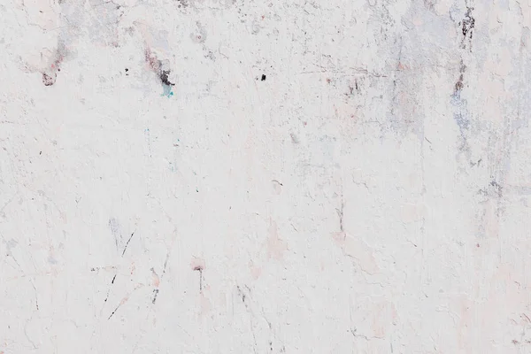 Çatlakları ve çizikleri olan beton bir duvarın dokusu arka plan olarak kullanılabilir.