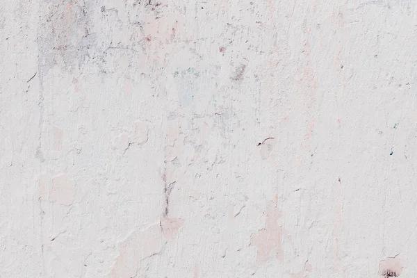 Çatlakları ve çizikleri olan beton bir duvarın dokusu arka plan olarak kullanılabilir.