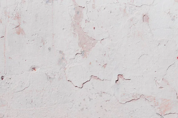 Çatlak beton duvarın çatlaklardan ve çiziklerden oluşan dokusu arka plan olarak kullanılabilir.