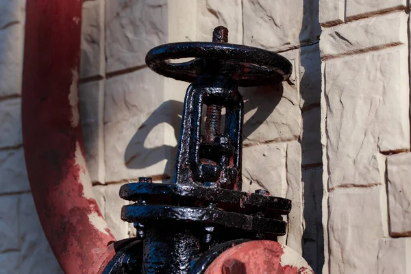 Kumsaldaki paslı çapa.