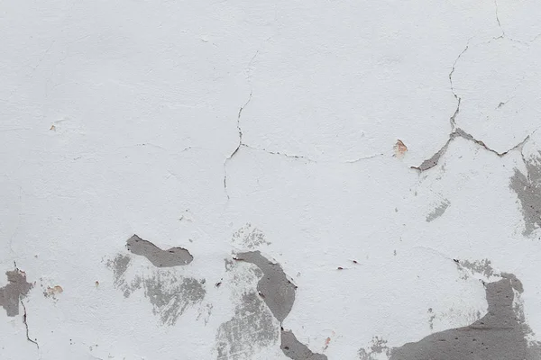 Eski duvarın çatlakları ve çizikleri arka plan olarak kullanılabilir.