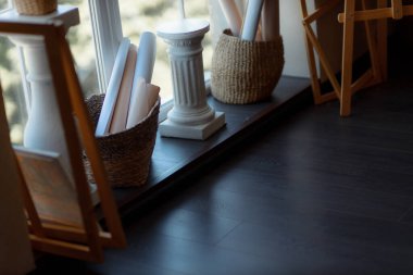 Plaster figurine on a wooden table. Drawing lessons. Art school concept.