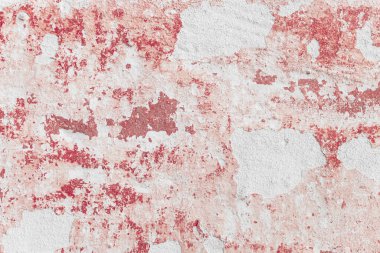 Çatlakları ve çizikleri olan eski beton duvarın dokusu arka plan olarak kullanılabilir.