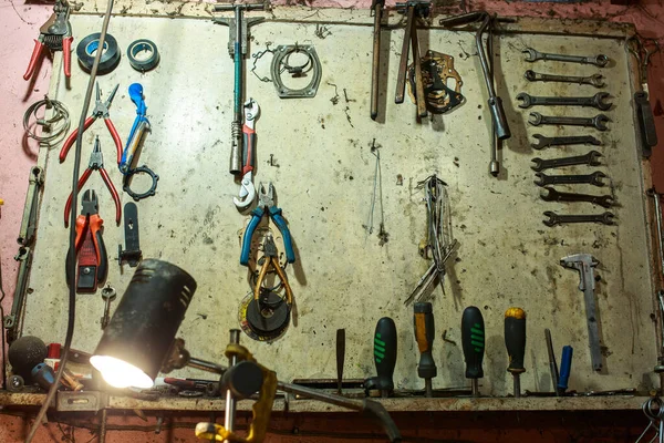 Chaos in the workplace. Service. An old repair shop. Place of manual labor. Unordered tool.