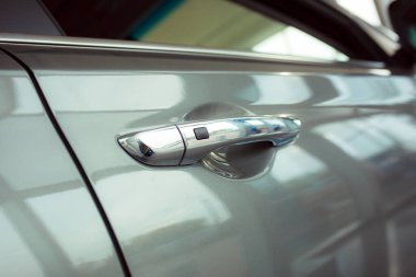 New car in the showroom. Part of the car. Closeup