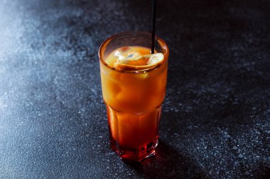 Tequila Sunrise drink. Refreshing alcoholic cocktail with orange and grenadine.