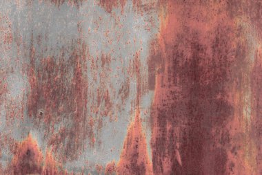 Çizik ve çatlaklarla paslı metal doku.