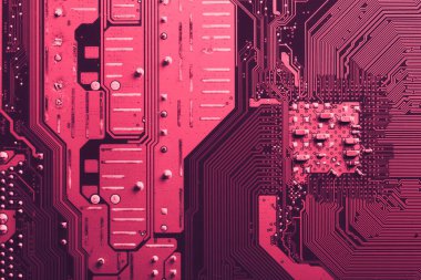 Old desktop motherboard. Chips and electronic components close-up. Can be used as a poster or background for design.