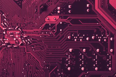 Old desktop motherboard. Chips and electronic components close-up. Can be used as a poster or background for design.