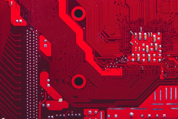 Old desktop motherboard. Chips and electronic components close-up. Can be used as a poster or background for design.