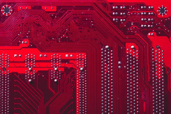 Old desktop motherboard. Chips and electronic components close-up. Can be used as a poster or background for design.