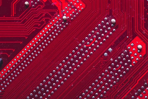 Old desktop motherboard. Chips and electronic components close-up. Can be used as a poster or background for design.