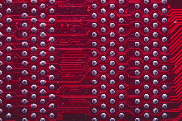 Old desktop motherboard. Chips and electronic components close-up. Can be used as a poster or background for design.