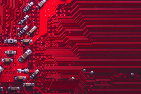 Old desktop motherboard. Chips and electronic components close-up. Can be used as a poster or background for design.