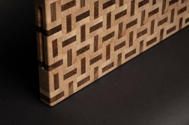 furniture desk, beige color wood surface on black background 