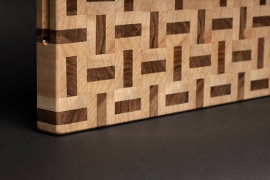 furniture desk, beige color wood surface on black background 