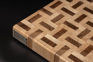 furniture desk, beige color wood surface on black background 