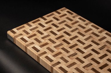 furniture desk, beige color wood surface on black background 