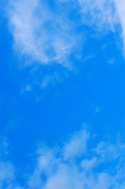 daylight blue sky with white fluffy clouds